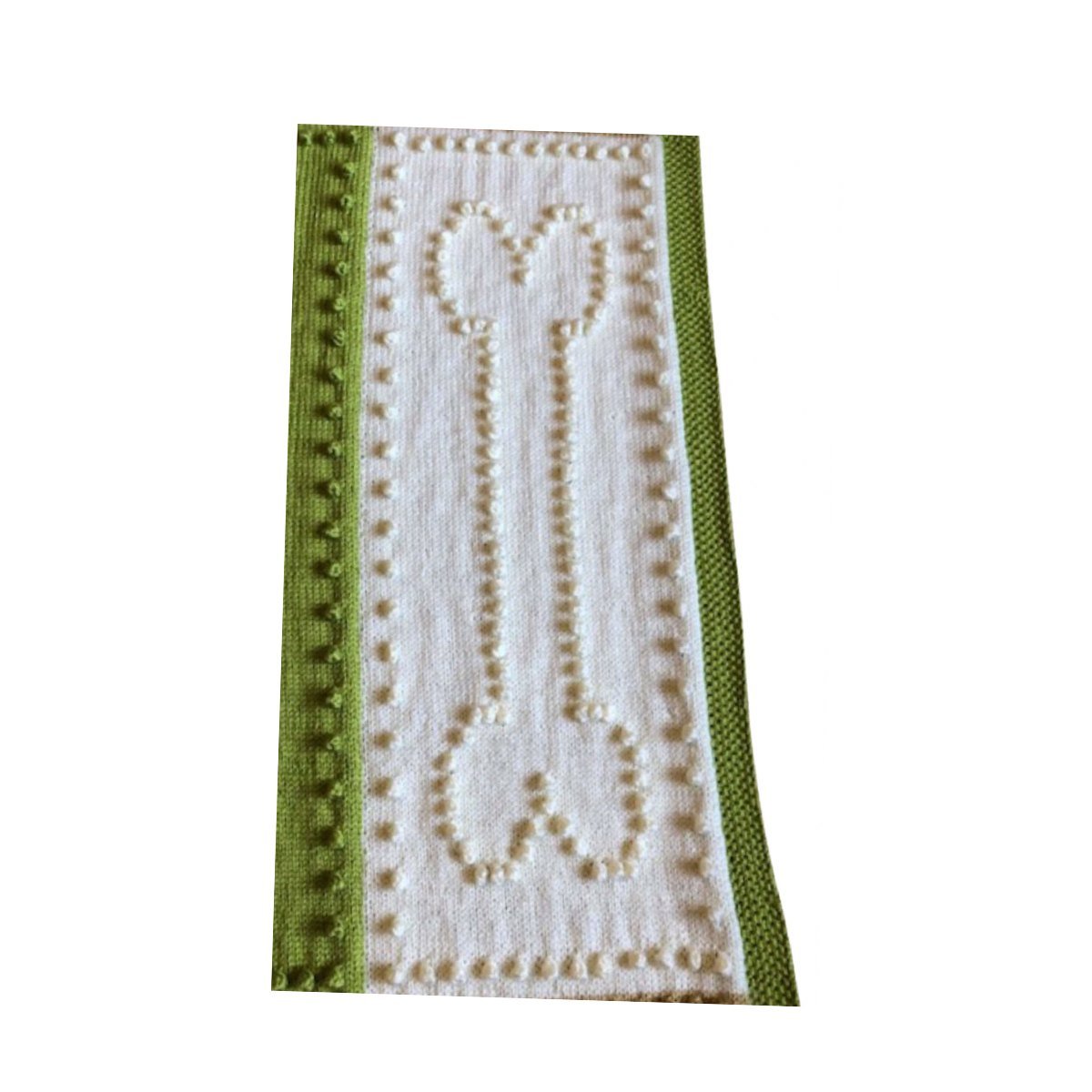 Close-up of cream and green dog bone panel on a knitted bobble stitch dog blanket with textured border detail