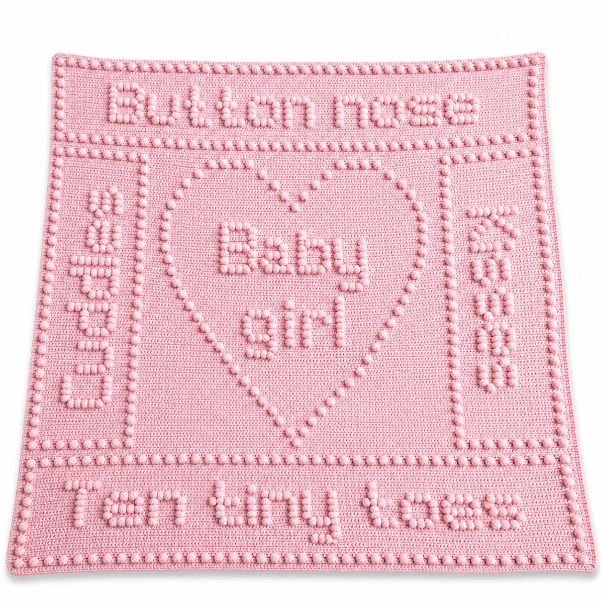 Button Nose Baby Girl blanket crochet pattern in soft pink displayed on a white background with a soft shadow.