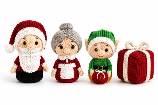 Hand knitted Santa, Mrs Claus, Elf and Present Christmas decorations on a white background with soft shadows