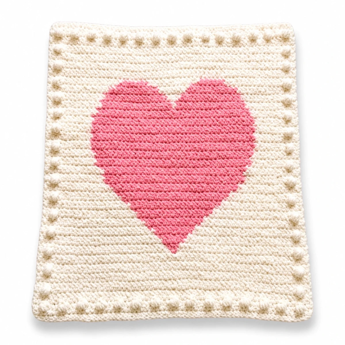 Chunky Intarsia Heart crochet pattern made with super chunky yarn displayed on a white background with a soft shadow.