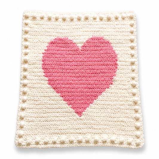 Chunky Intarsia Heart crochet pattern made with super chunky yarn displayed on a white background with a soft shadow.