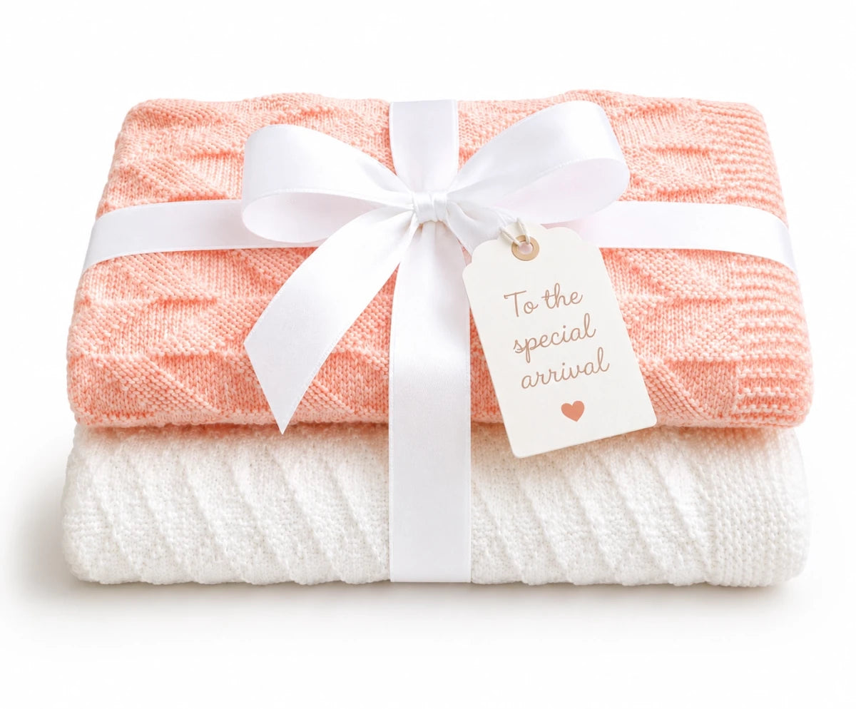 Gift-wrapped Criss Cross and Parallel Lines baby blanket knitting pattern bundle with white ribbon and a special arrival gift tag