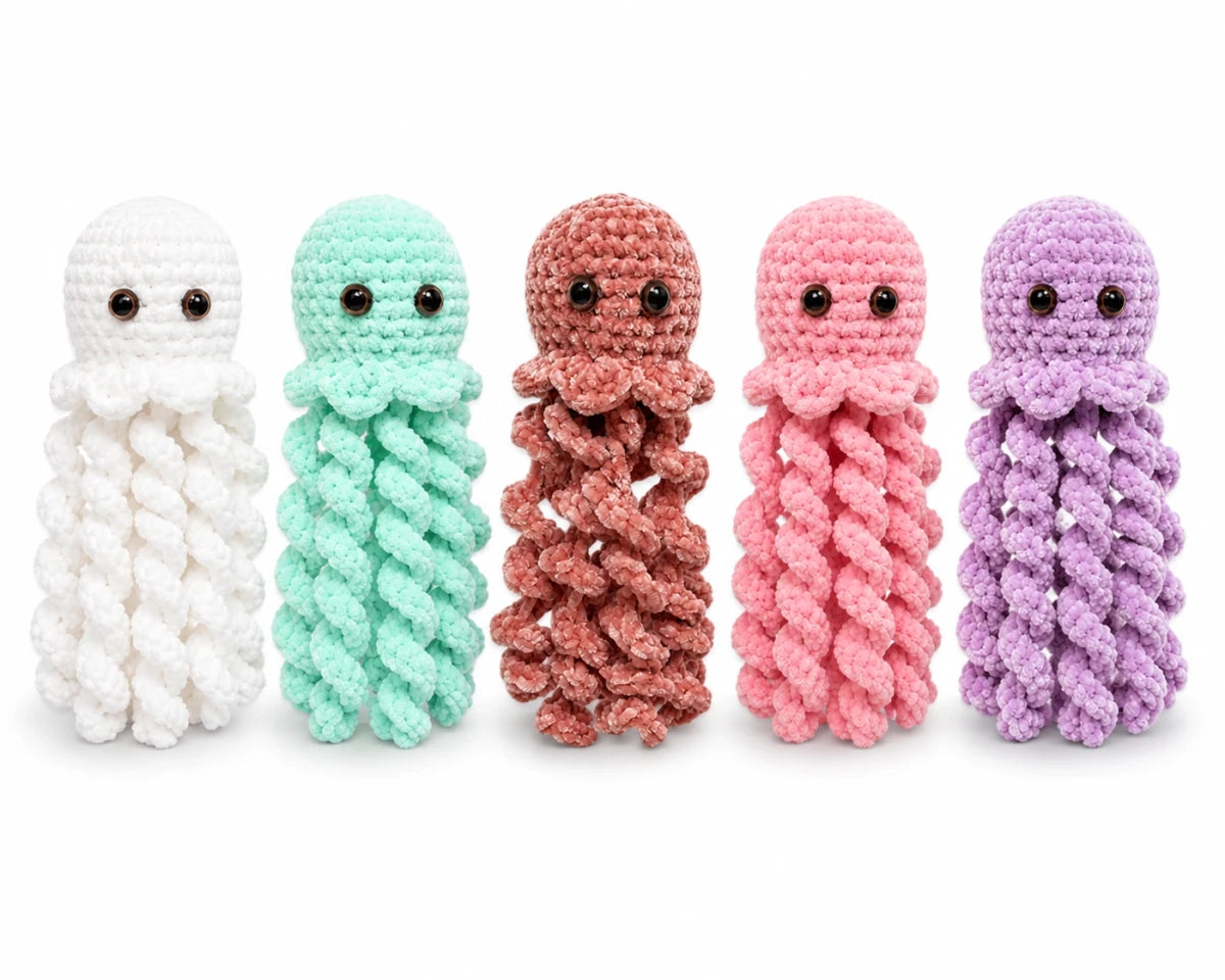 Crochet jellyfish plush toy colour options in white, mint, dusty rose, pink and lilac on a white background