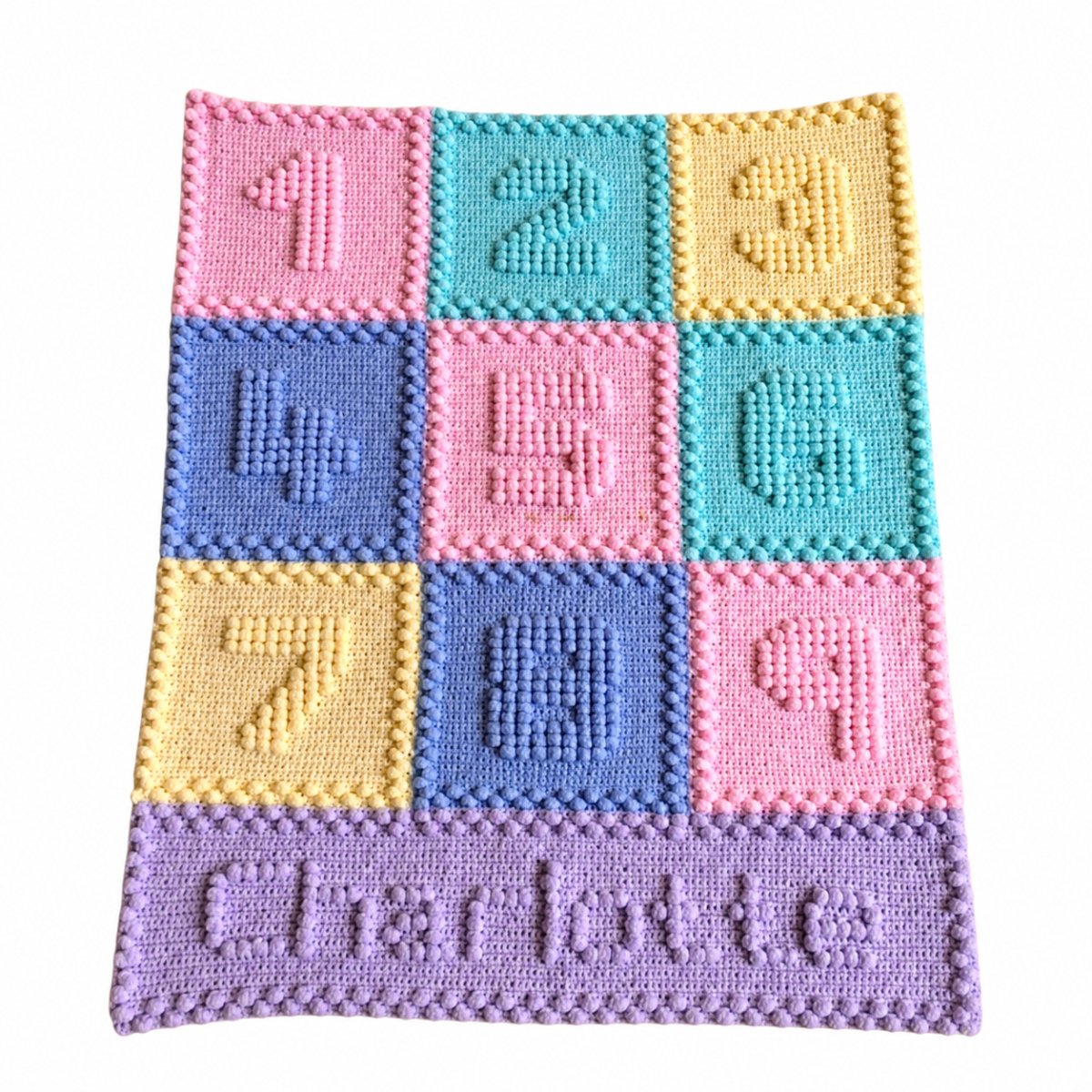 Personalised crochet baby blanket with colourful puff stitch numbers