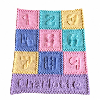 Personalised crochet baby blanket with colourful puff stitch numbers