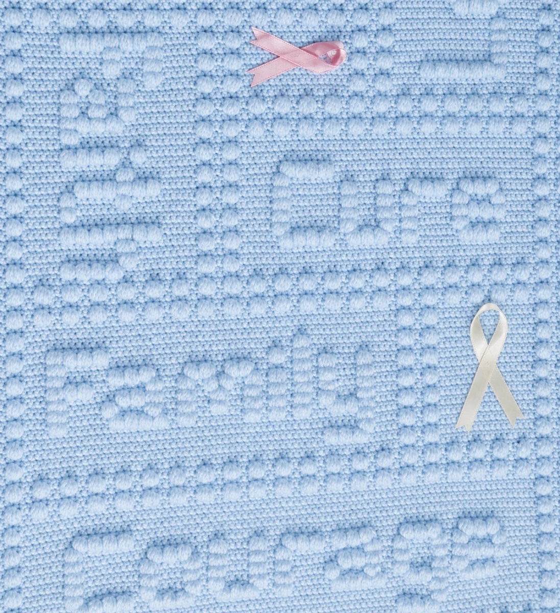 Texture Close-Up of Free Cancer Support One-Piece Crochet Lap Blanket Pattern in Soft Blue with Family and Strength Wording