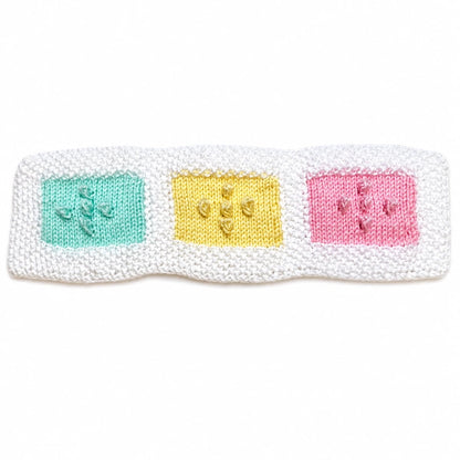 Free knitting pattern sample squares for practising intarsia and bobble stitch techniques in pastel mint, yellow and pink colours with linked video tutorial by Peach Unicorn Designs