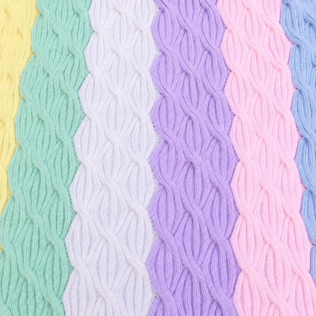Free Rainbow Waves baby blanket knitting pattern with pastel cable stripes
