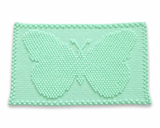 Free small butterfly one-piece crochet blanket pattern on a white background with soft shadow