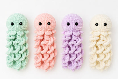 Pastel plush jellyfish knitting pattern colour variations in mint green peach pink lilac and cream yarn