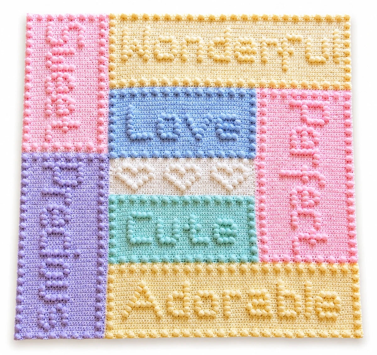 Precious Motifs Baby Blanket crochet pattern featuring pastel puff stitch word panels including Wonderful, Love, Cute, perfect, Sweet. Precious and Adorable.