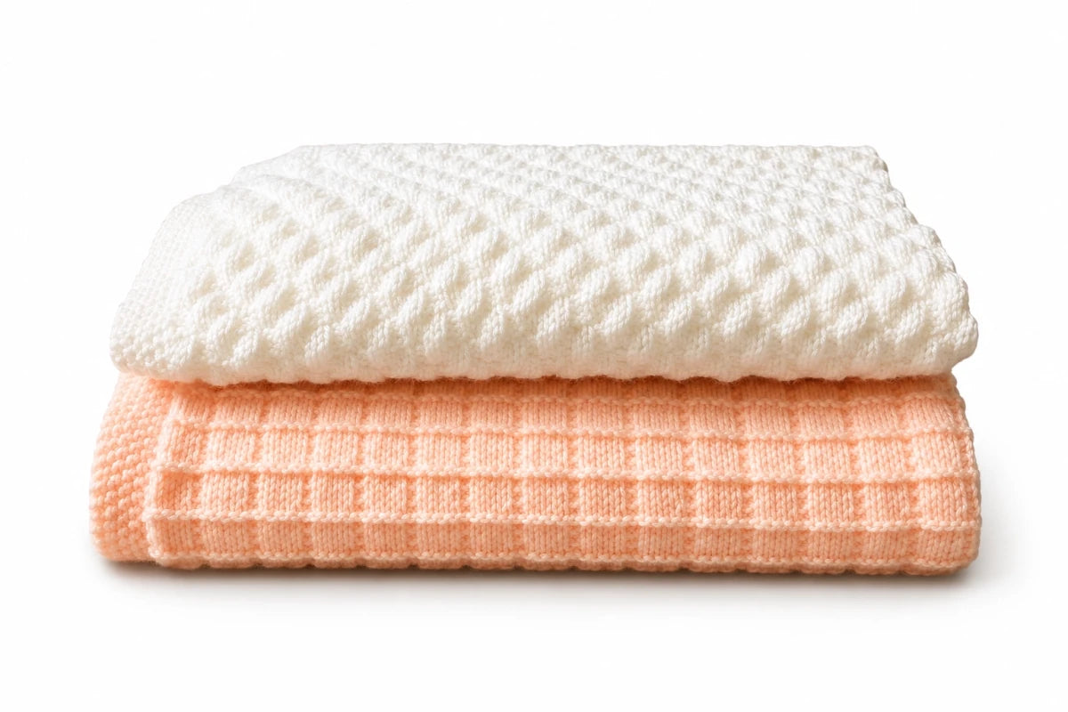 Pretty Squares and Diagonal Bumps beginner baby blanket knitting pattern bundle in white and peach yarn