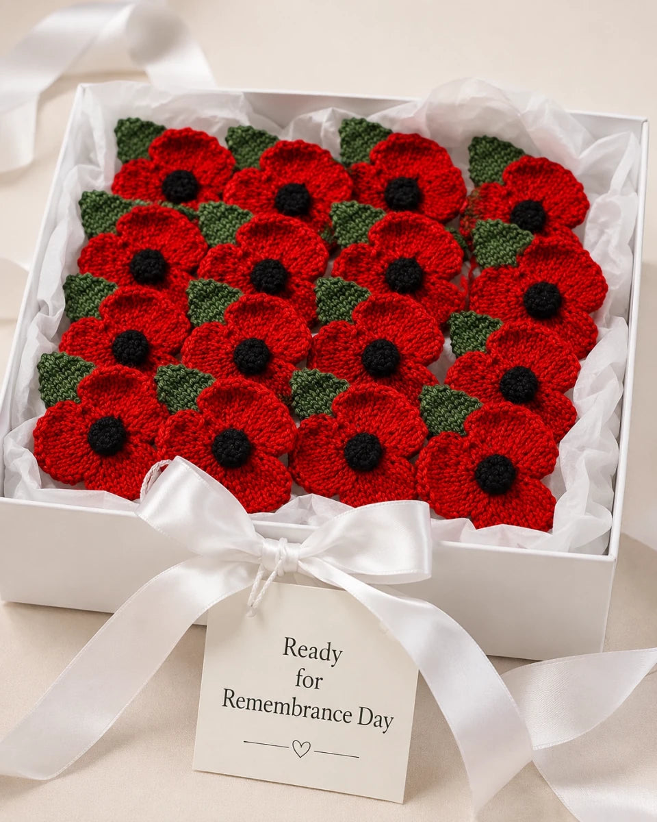 Gift box filled with hand knitted remembrance poppies ready for Remembrance Day charity displays