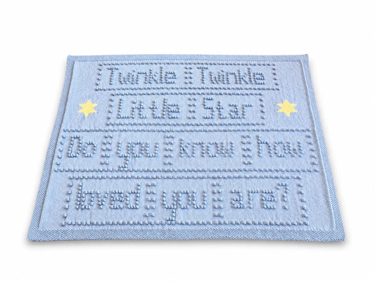 Twinkle Twinkle Little Star baby blanket knitting pattern with bobble stitch words and intarsia stars