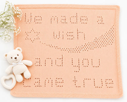 Peach Coloured, We made a Wish blanket with white flowers ann white baby toys.